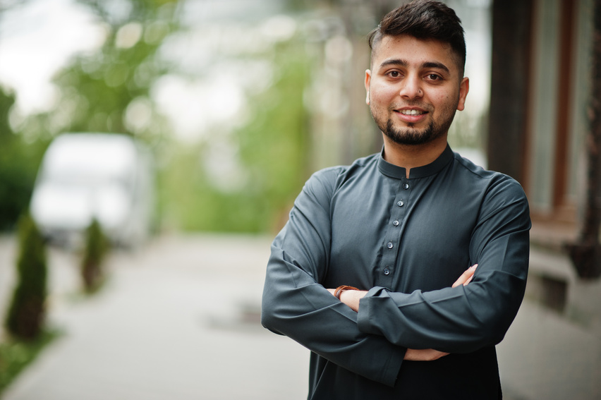 Ð¡onfident pakistani indian muslim arabic boy in grey kameez sha